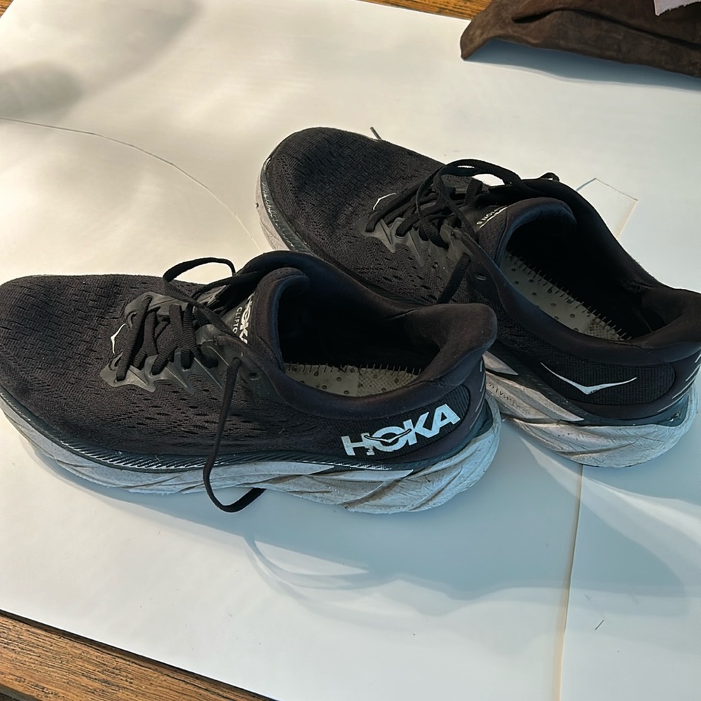 Lightly worn black Hoka Clifton eight sneakers in a size 11